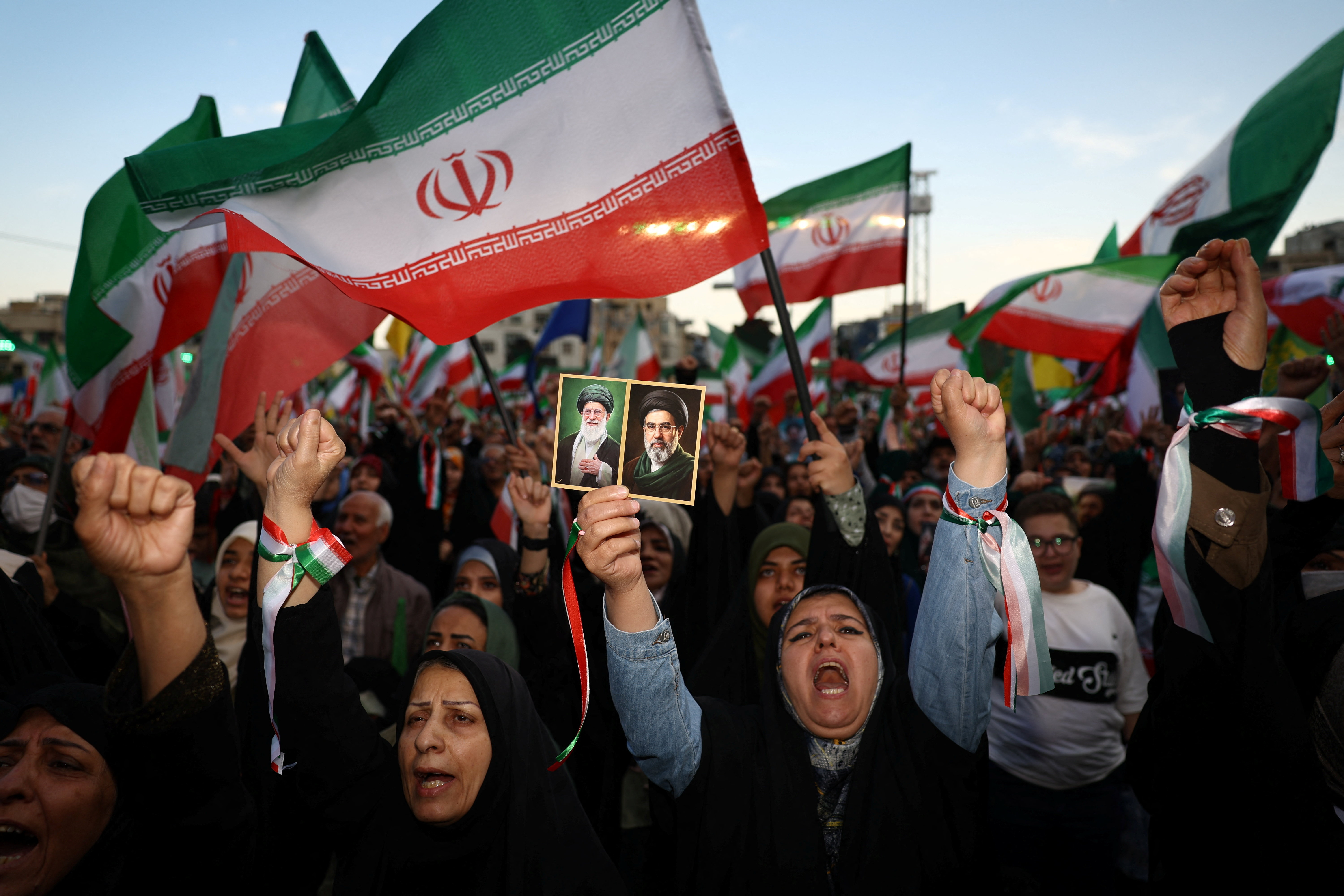 People chant during a rally in Tehran, Iran. Tehran submitted a 14-point peace plan on May 1–2 calling for a complete end to the war in 30 days, deferring nuclear talks to a separate negotiation phase, as the IRGC warned it remained "fully prepared" to resume full operations if diplomacy failed. (Reuters / Al Jazeera)